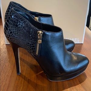 MICHAEL KORS black and gold platform booties